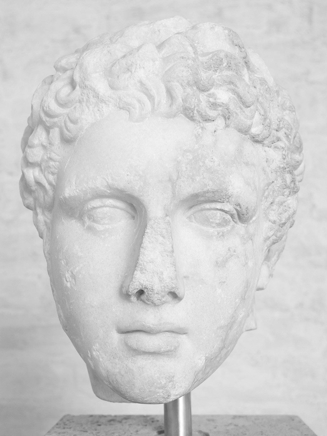 Kopf eines nackten Jünglings, wohl des Gottes Hermes. Römische Kopien eines griechischen Originals. Um 370 v. Chr.